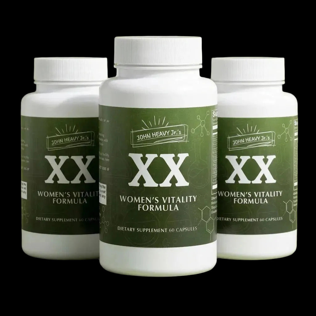 Three bottles of John Heavy Jr.'s XX Women's Vitality Formula on a green background